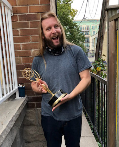 Ryan holding an Emmy. When you win in the year of a pandemic you get to do this outside your own home instead of at a swanky gala.